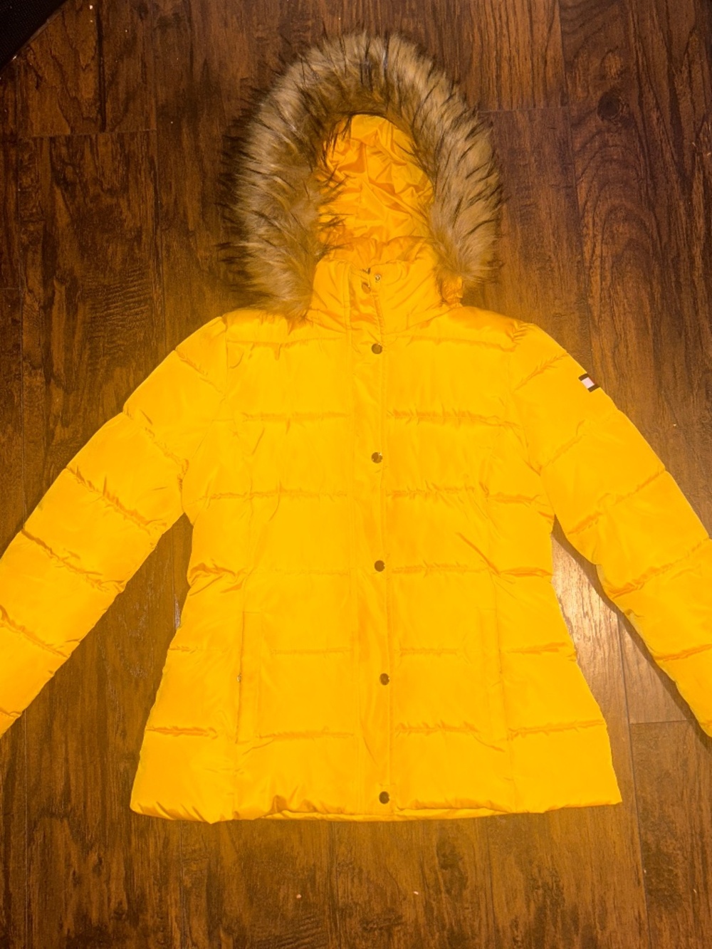 Tommy Hilfiger puffer coat with faux fur detachable hood.
